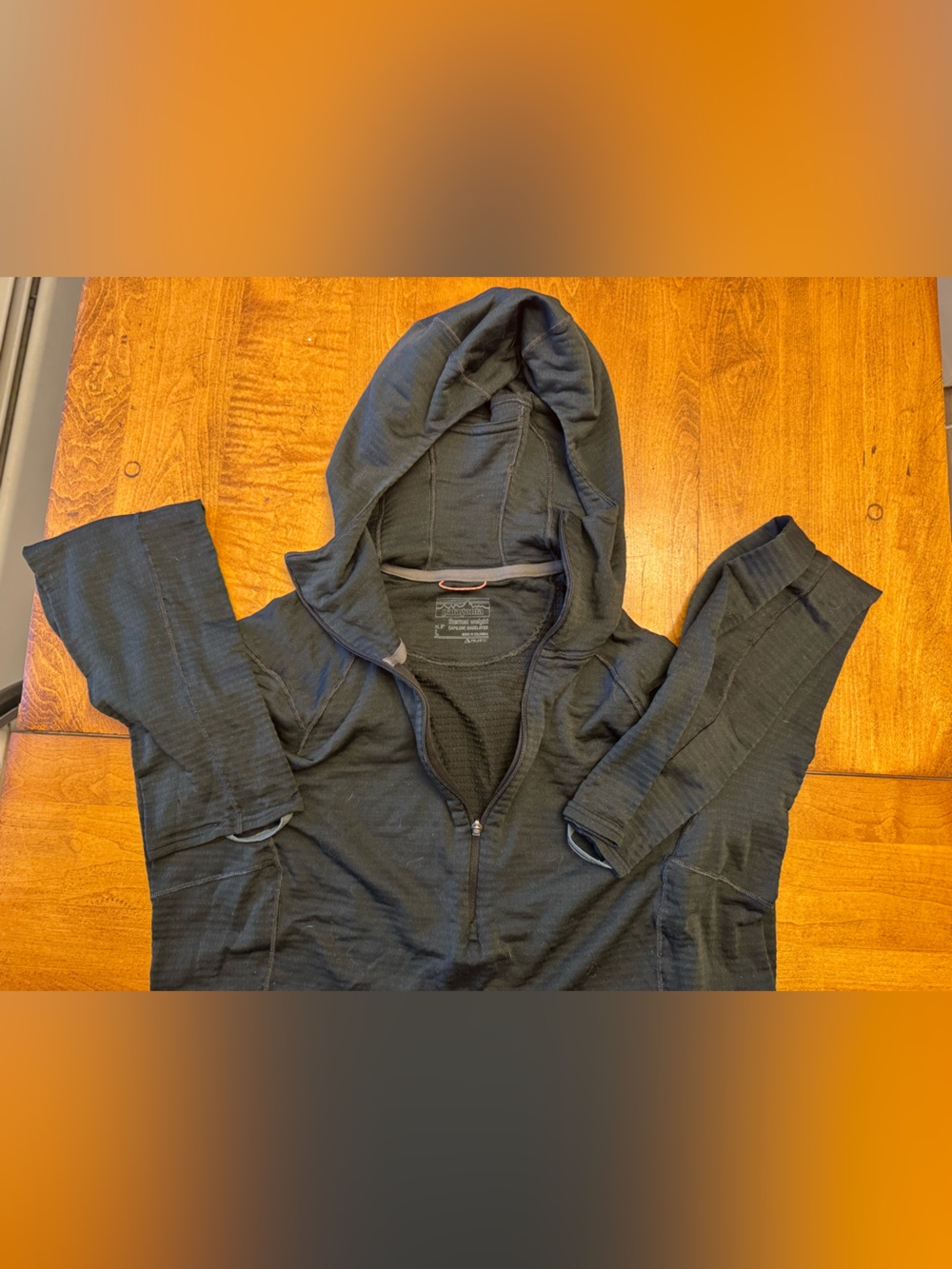 Women’s Capaline Black Hooded quarter zip layer